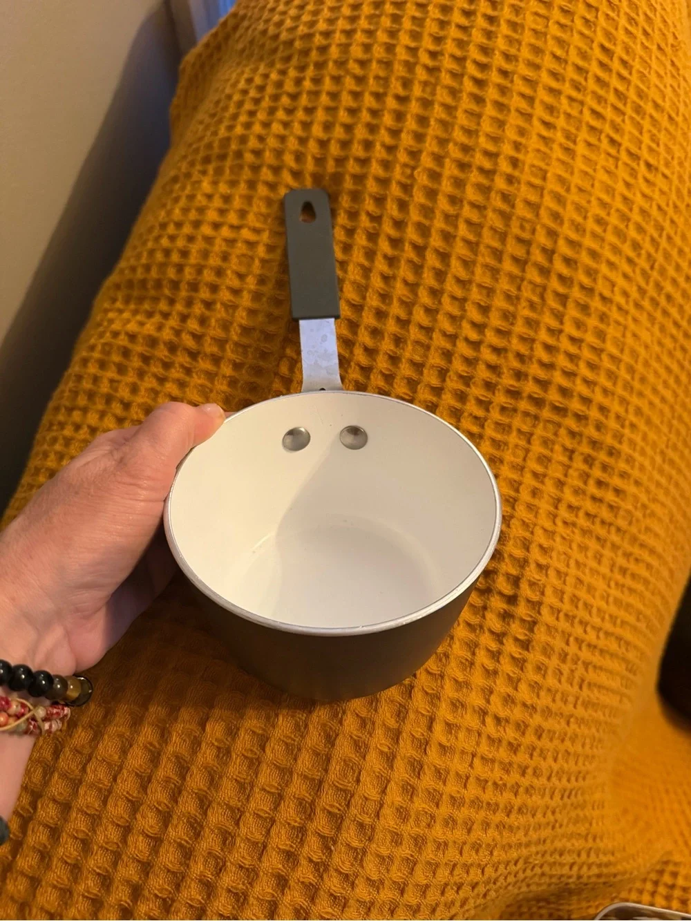 Non-Branded White Ceramic-Coated Saucepan with Black Handle